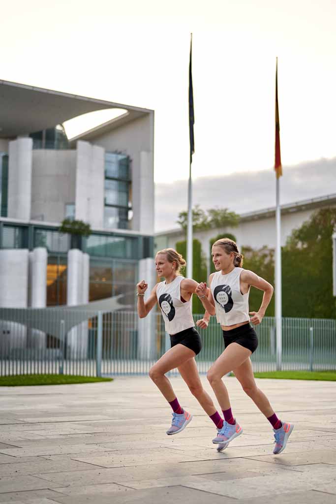 two young women running in Berlin