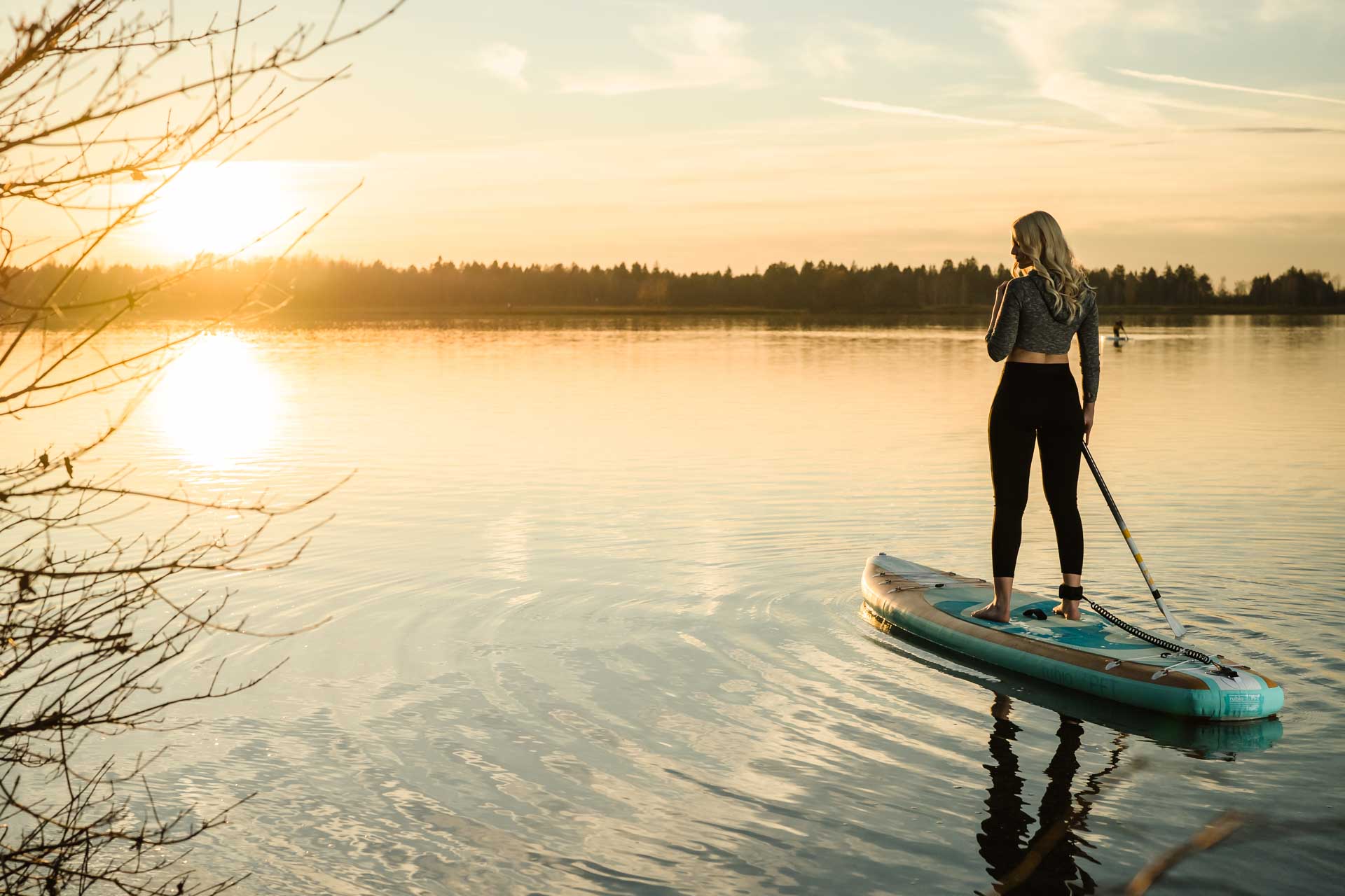 SUP (Stand Up Paddling) in Bavaria at sunset
